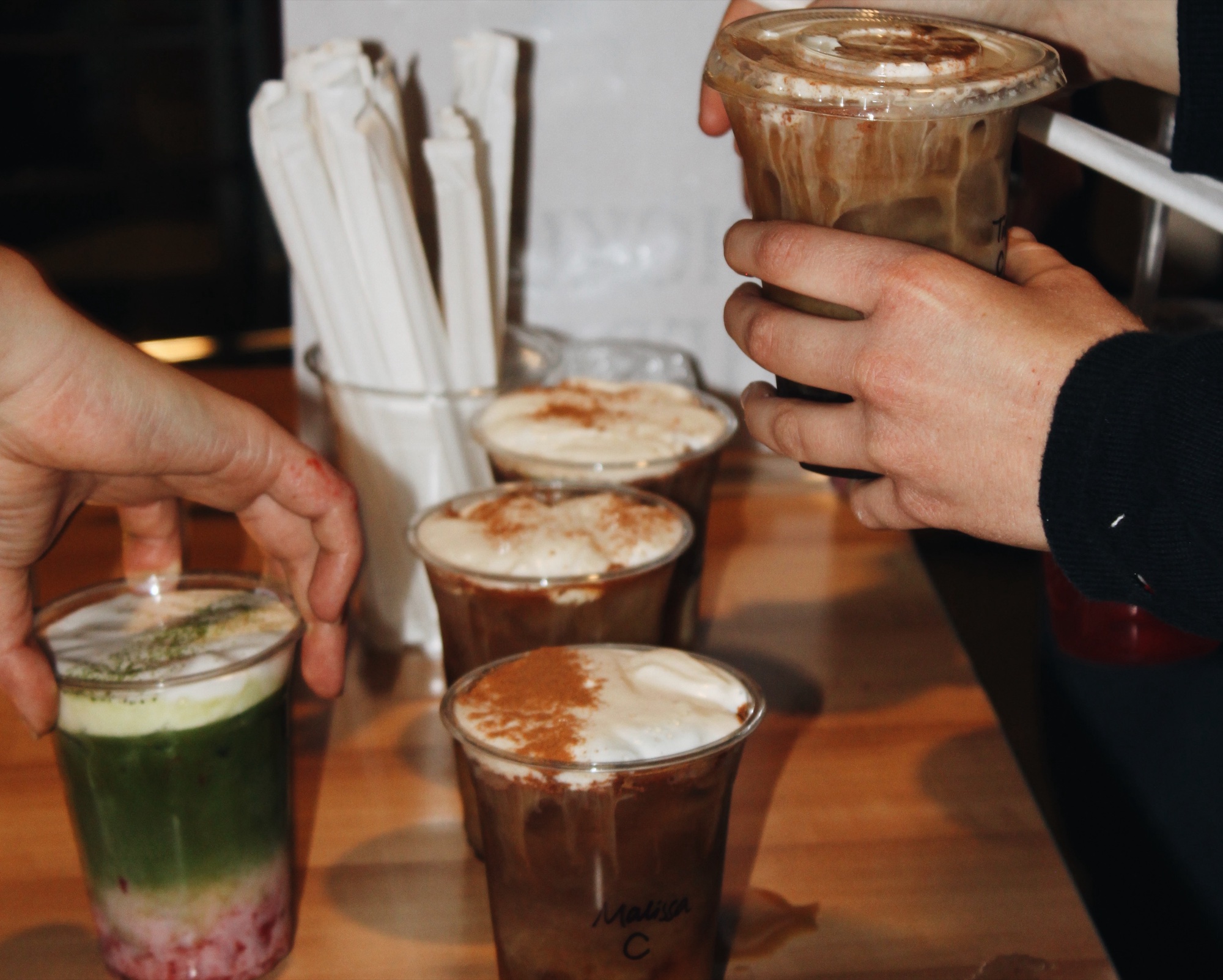 Behind-the-scenes drink photography — iced coffees and matcha